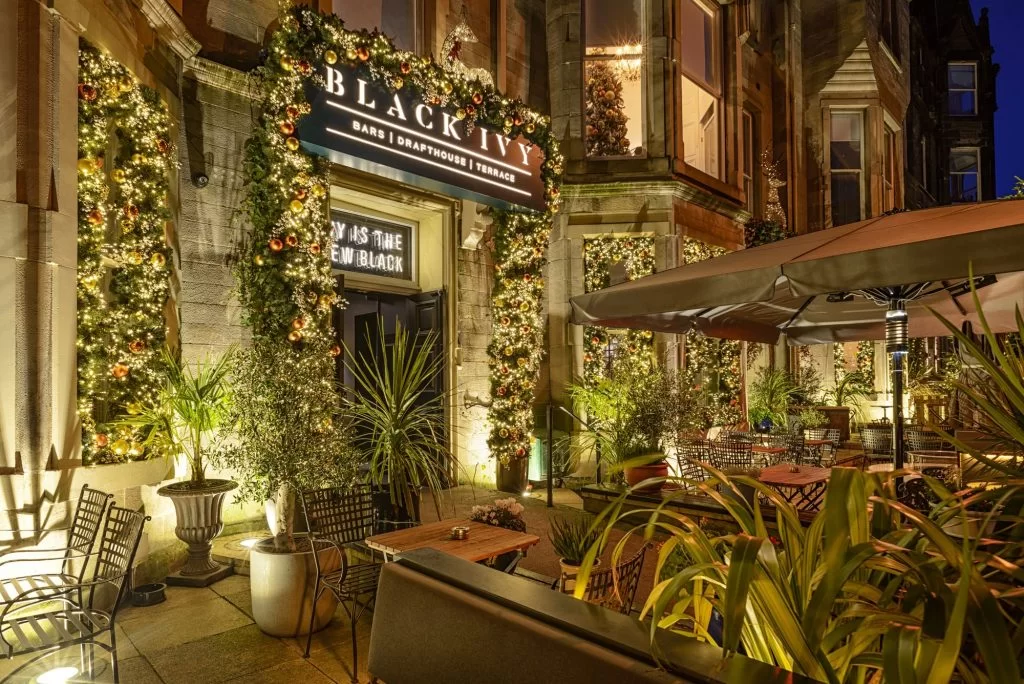 black ivy hotel at night